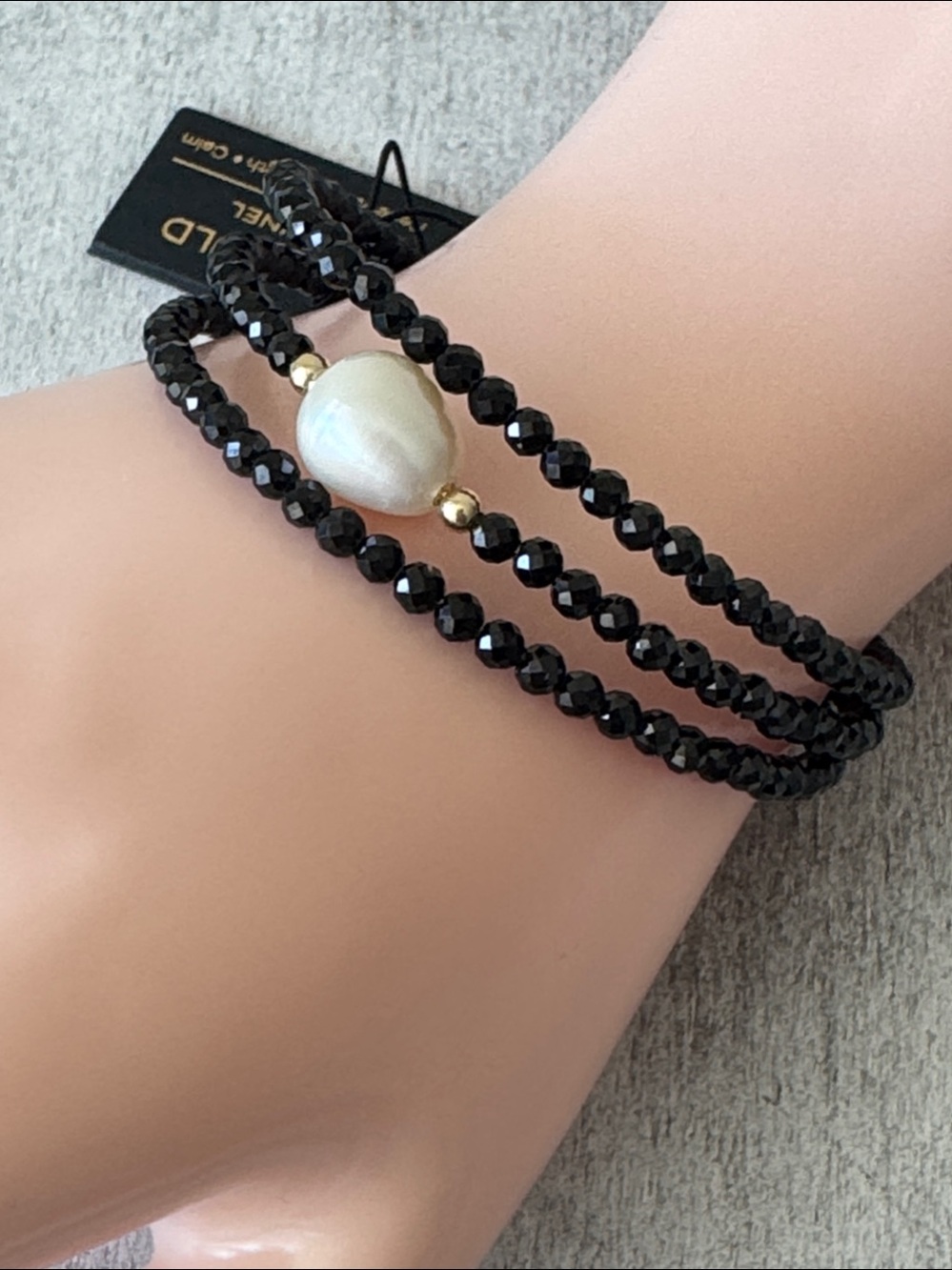 GEORG K
made in usa 14kt gold black spinel pearl
wrap bracelet